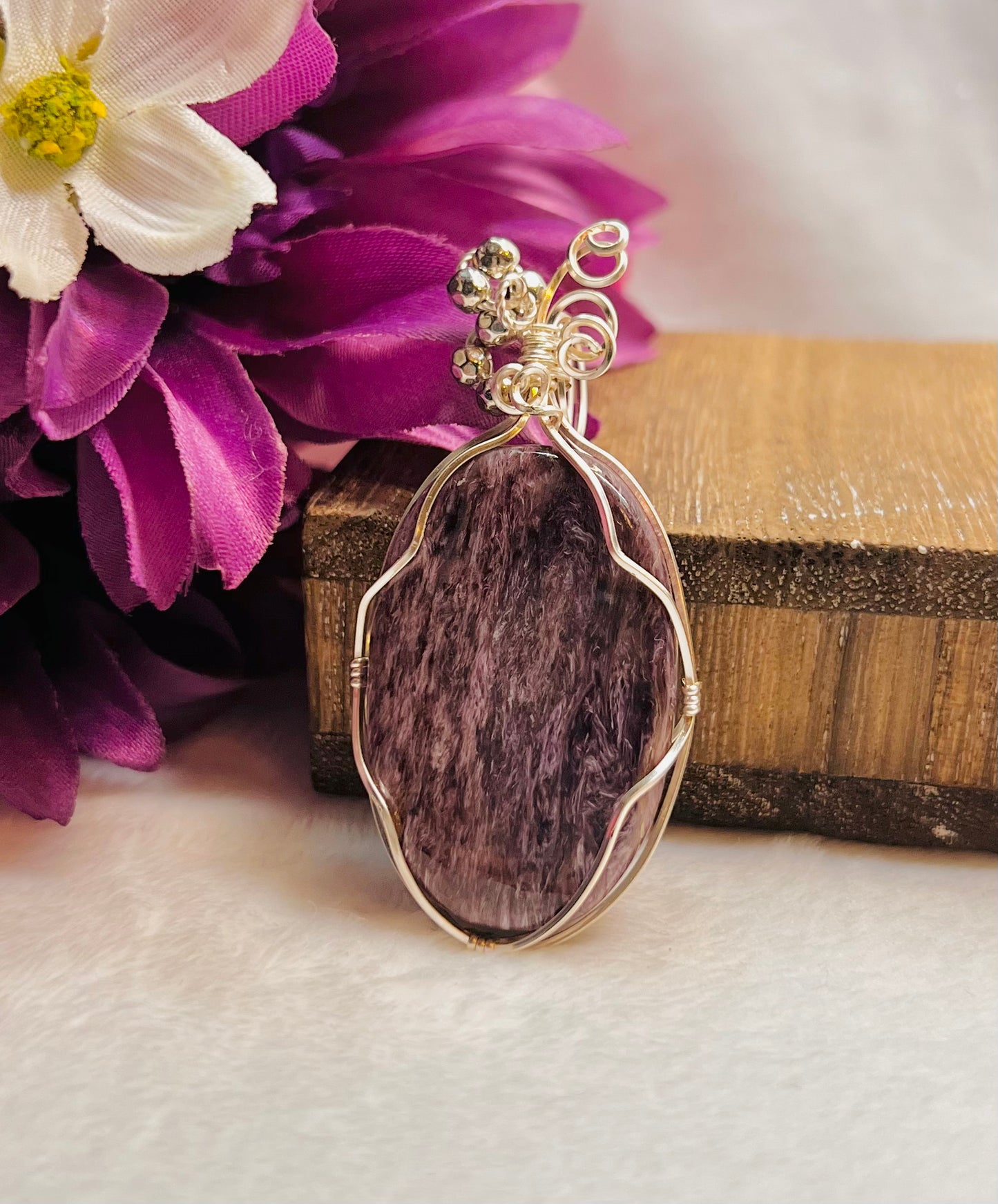 Large purple charoite pendant